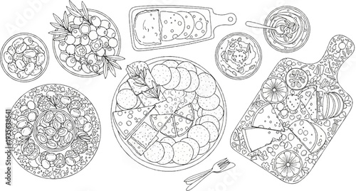 Overhead view of a delightful assortment of cheeses, olives, and antipasti on platters