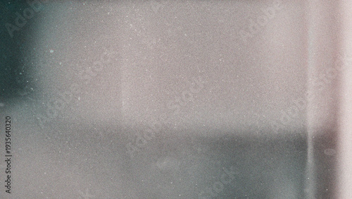Abstract textured background with vintage film grain and subtle light leaks soft focus