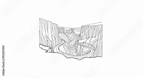 Winding road navigates through a dramatic canyon landscape