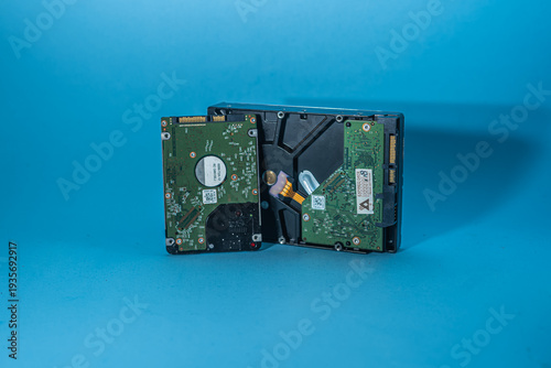 Computer Hard Disk Drives on Blue Background