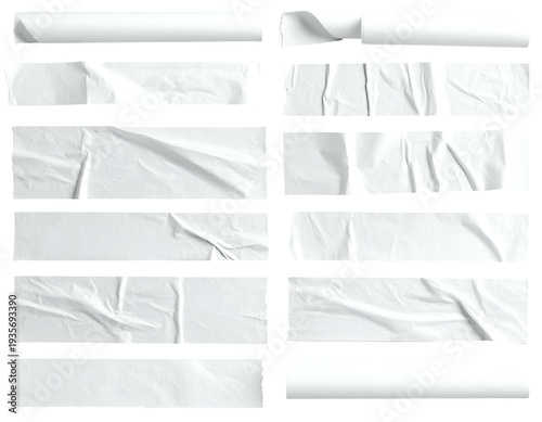 Array of white, rectangular, torn paper strips with creases & subtle shadows, arranged on a black backdrop