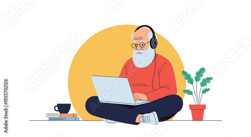 Elderly man with white beard and headphones working on a laptop while sitting on the floor in a comfortable home setting.