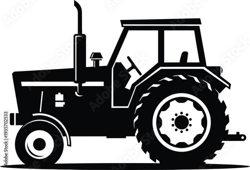 Black silhouette of a tractor with large tires and a cab