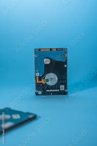 Laptop Hard Disk Drive on Blue Background