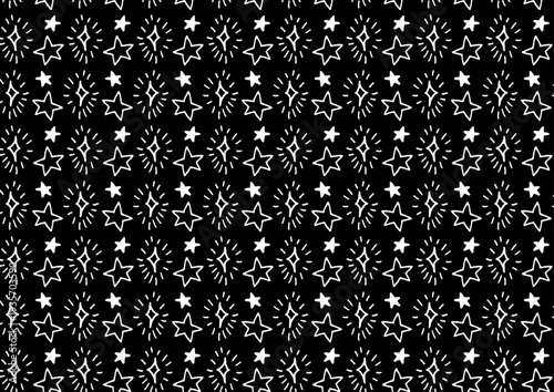 白黒の手描き星イラストパターン背景素材