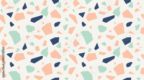 A modern and colorful seamless terrazzo style pattern featuring abstract irregular shapes in pastel peach, light green, and dark blue.