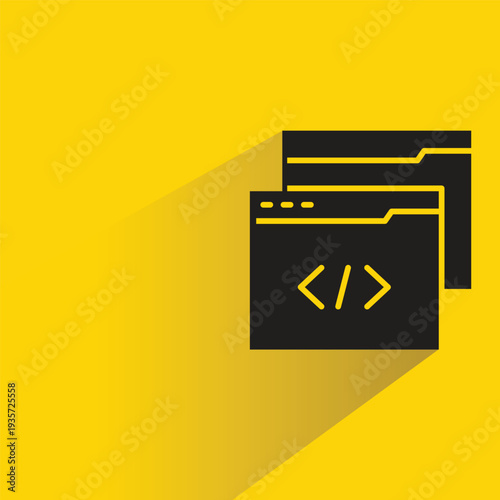web coding icon with shadow on yellow background
