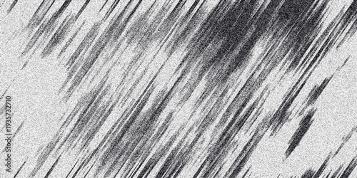 Dynamic monochrome abstract background with sharp diagonal lines and a fine granular texture, conveying energy and movement for graphic design applications