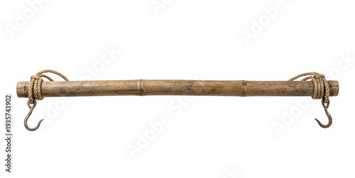 Bild auf Leinwand Traditional bamboo carrying pole with rusted iron hooks