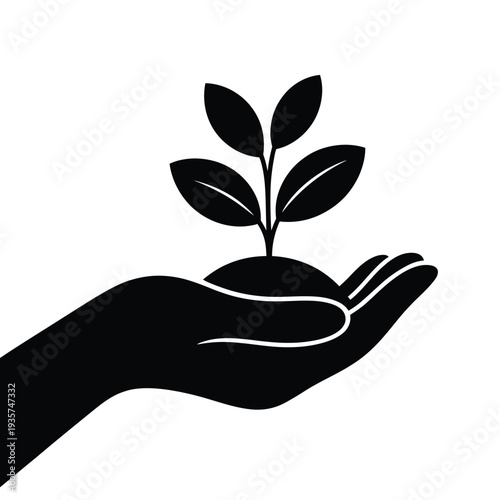 A hand gently cradling a small plant sprouting from soil