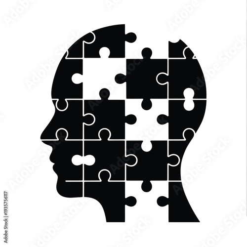A human head silhouette constructed from interlocking puzzle pieces