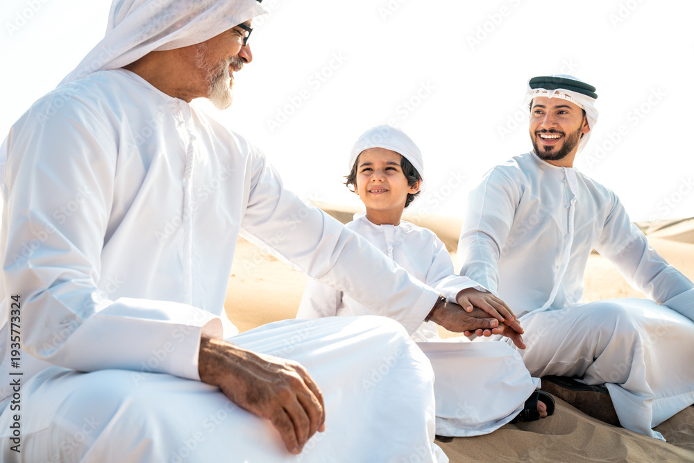 Obraz premium Three generation family making a safari in the desert of Dubai