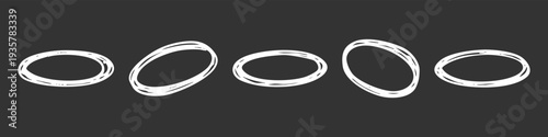 Set of hand-drawn white chalk scribble ovals and circles on a dark background. Artistic frames for highlighting and emphasis in designs.