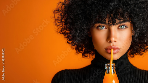 African American drinking a...