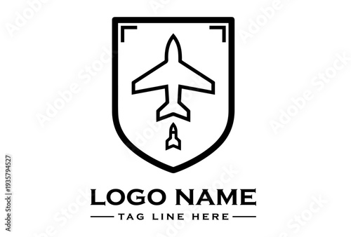 A black and white logo featuring a shield with an airplane and missile emblem, representing joint forces, on a clean white background with a simple, bold design.