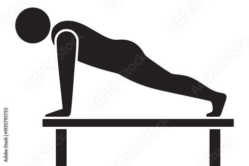 A person in a plank position on a table for exercise and fitness
