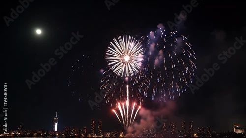 Fireworks Display Over City Skyline at Night with Moon.