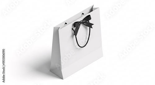 Elegant White Paper Bag with Black Ribbon on Clean White Background Showing Modern Minimalist Design Ideal for Shopping and Gifts with Focus on Simplicity and Style