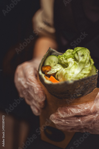 hands of man and woman preparing food