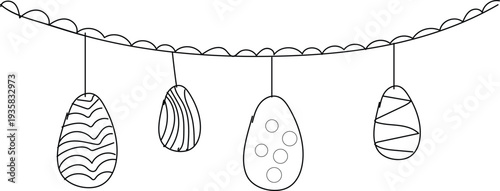 Easter sunday eggs hanging from decorative garland