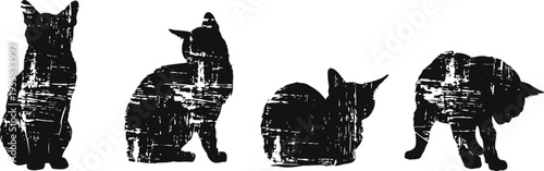 set of four distressed black cat silhouettes in various sitting and crouching poses