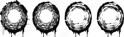 set of four grunge circular frames with rough, distressed, and splattered edges for design decoration