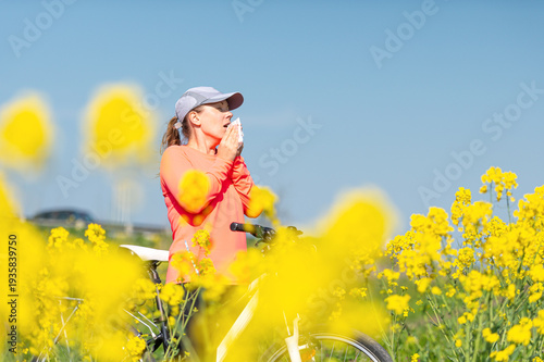 woman suffering from pollen allergy while  training outdoors