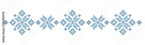 The pattern is embroidered with a cross stitch. Traditional Ukrainian ornament with flowers.