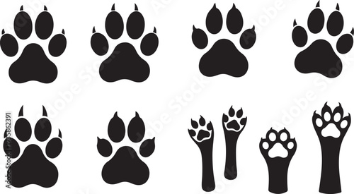 Collection of various animal paw prints and footprints in black silhouette