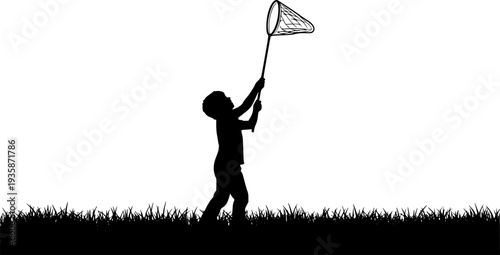 A silhouette of a child standing in a grassy field, holding a butterfly net raised high above their head, as if ready to catch something
