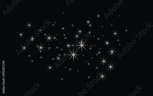 Sparkling white stars on a black background night sky or fireworks display