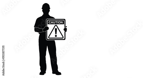 A solitary worker stands holding a caution sign emphasizing workplace safety with a striking dark silhouette high quality professional