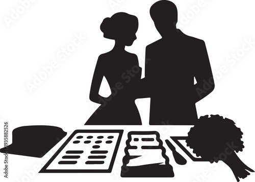 A silhouette of a couple standing behind a table with wedding planning items and a floral bouquet
