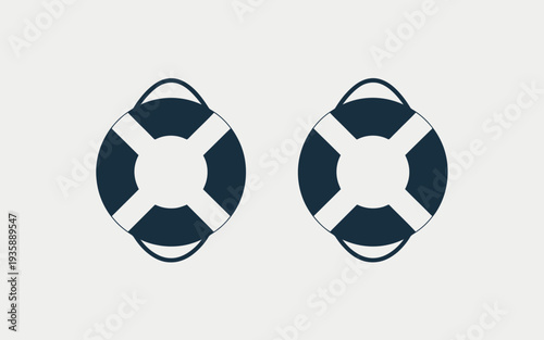 Two lifebuoys with white stripes on light gray background  safety equipment