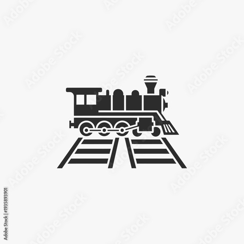 Vintage steam locomotive on railway tracks, retro silhouette for historical transport.