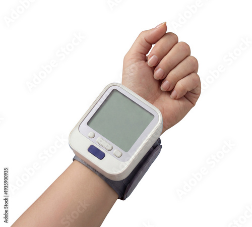 Close-up of a digital wrist blood pressure monitor on a hand, isolated on a white background. Modern electronic healthcare device for checking blood pressure at home. Blank screen with copy space