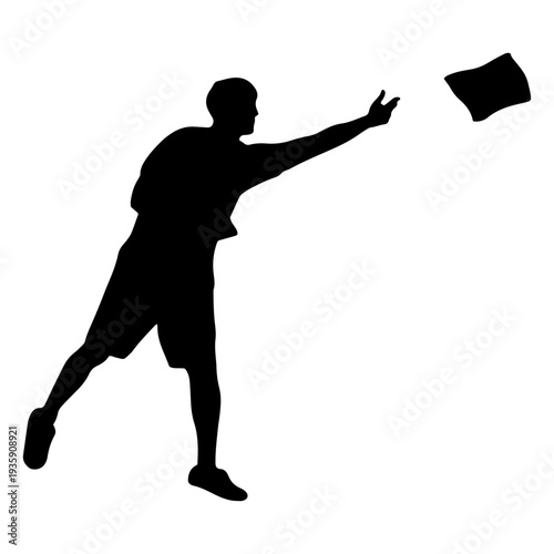 Man playing cornhole game