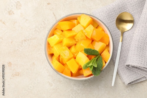 Принти на полотні Pickled peaches with mint in glass bowl and spoon on grey table, flat lay