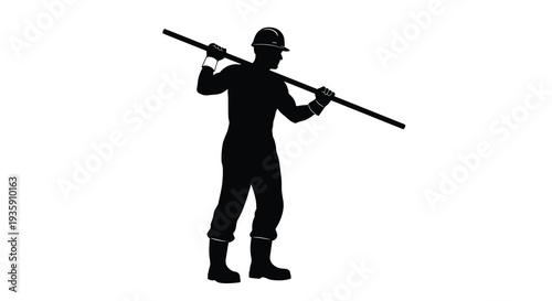 A construction worker carrying a wooden beam across his shoulders is depicted in a striking black silhouette high quality
