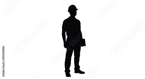 A full body view of a man in work attire holding a tablet isolated against a bright white background silhouette