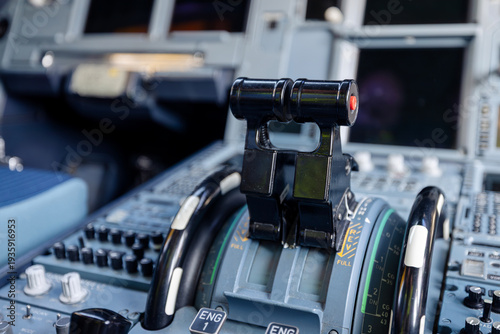 Valokuva Close-up view of engine throttle levers inside commercial airplane cockpit