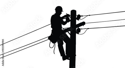 A lineman skillfully repairs high voltage power lines while perched on a utility pole depicted as a silhouette high quality