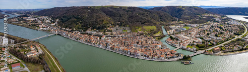 Aerial panorama view beside the old town around the city Saint-Vallier in France on a sunny spring day. 