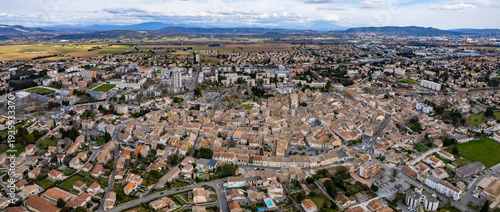  Aerial panorama view beside the old town around the city Pierrelatte in France on a cloudy spring day. 