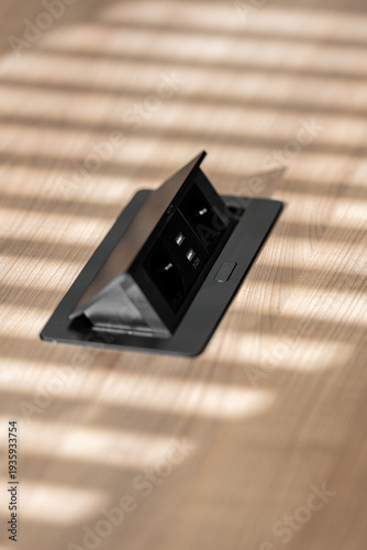close up of retractable electrical sockets