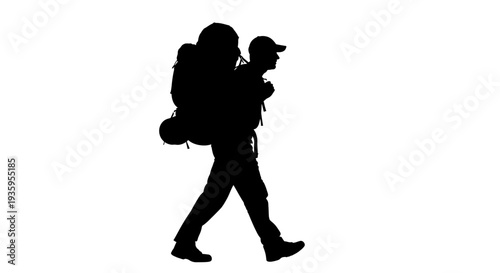 Silhouette of a man hiking outdoors.