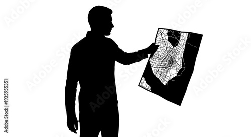 Man holding large map document.