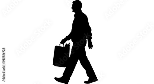Businessman walking with briefcase in hand.