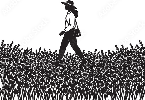 Woman walking through flower field silhouette