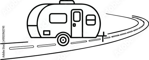 Camper trailer traveling along a road